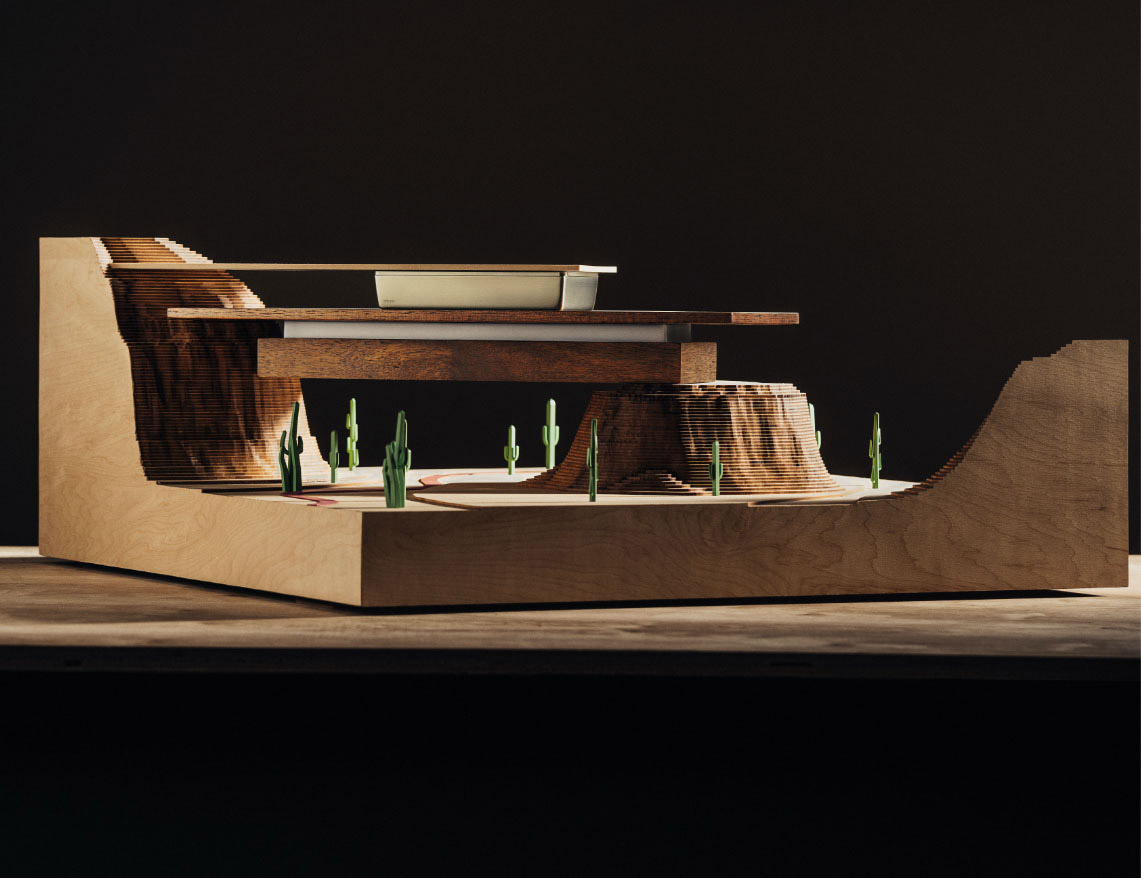 The Raincan Showerhead from the Frank Lloyd Wright® Bath Collection by Brizo®, showcased in an architectural model.
