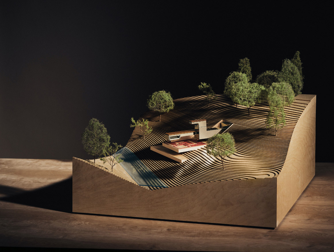 The Single Handle Wall-Mount Lav from the Frank Lloyd Wright® Bath Collection by Brizo®, showcased in an architectural model.