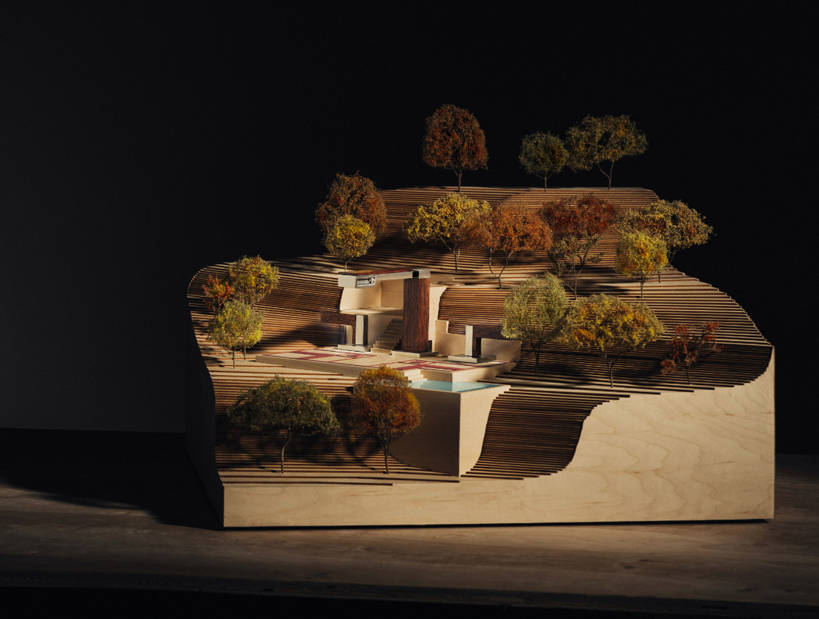 The Widespread Deck-Mount Lavatory Faucet from the Frank Lloyd Wright® Bath Collection by Brizo®, showcased in an architectural model.