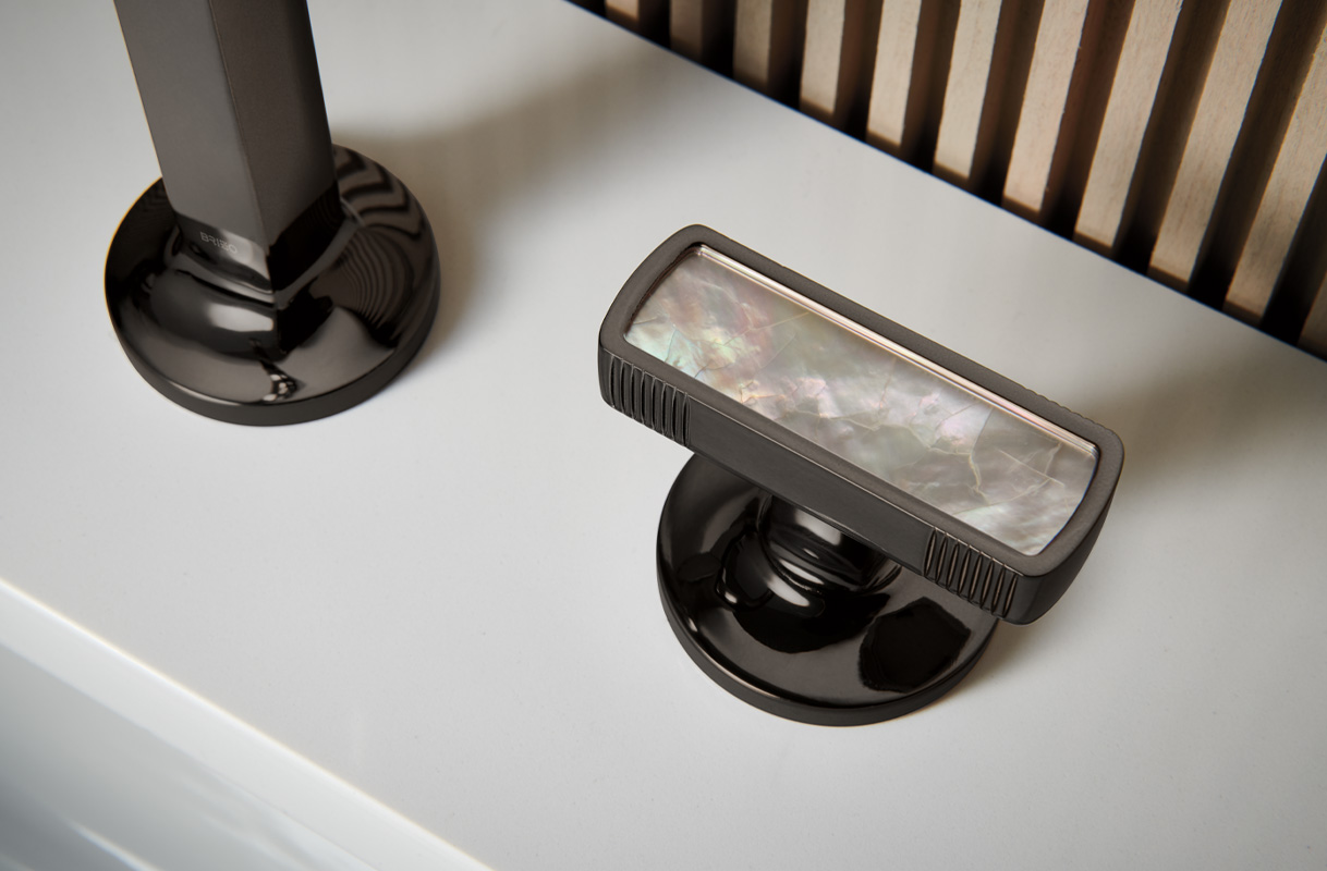 Featuring the Kintsu® Widespread Lavatory Faucet WITH ARC SPOUT AND MOTHER OF PEARL KNOB HANDLES. 