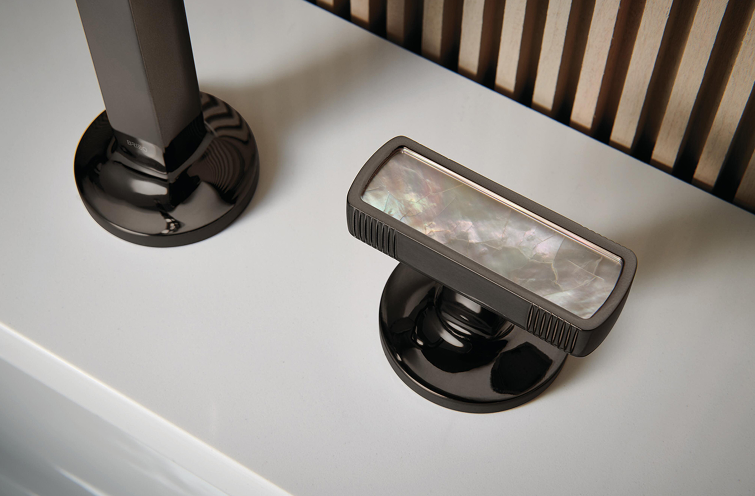 Featuring the Kintsu® Widespread Lavatory Faucet With Mother of Pearl Knob Handles