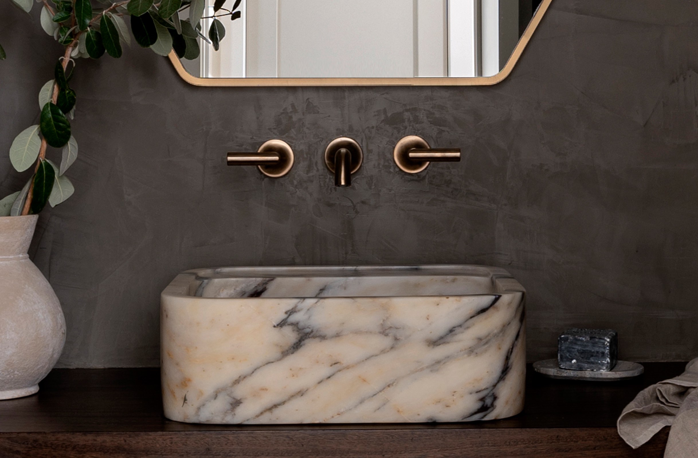 Interior Designer: Nicole Salceda  / Stylist: Eye for Pretty At Home / Photographer: Jessica Brydson / Featuring the odin® two-handle wall mount lavatory faucet with lever handles in Brilliance® Luxe Gold®