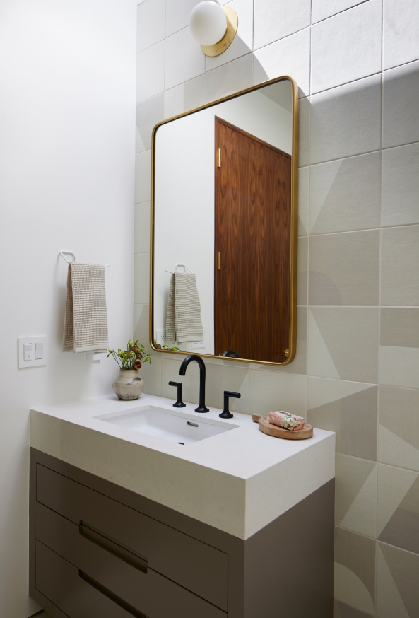 Interior Designer: Natalie Myers / Beverly Hills, CA 90210 / Photographer: Jessica Alexander / Featuring the Jason Wu for Brizo™ Widespread Lavatory Faucet with High Lever Handles in Matte Black